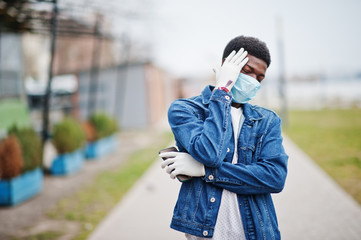 African man at park wearing medical masks protect from infections and diseases coronavirus virus quarantine.