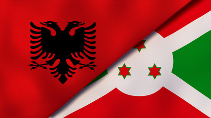 The flags of Albania and Burundi. News, reportage, business background. 3d illustration