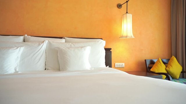 Pan across an attractive well appointed resort hotel room.