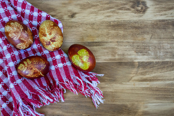 traditional Easter eggs in basket painted by boiling in red onion leaves - organic food