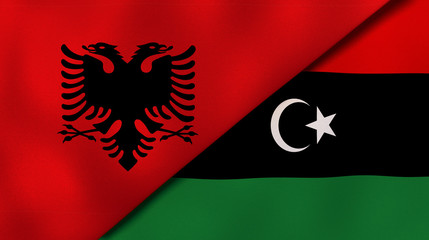 The flags of Albania and Libya. News, reportage, business background. 3d illustration