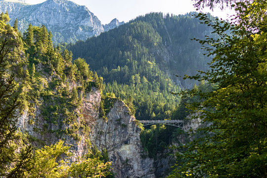 View of the beautiful Marienbrücke bridge in the middle of the Alps. Photograph taken in Schwangau, Bavaria, Germany.