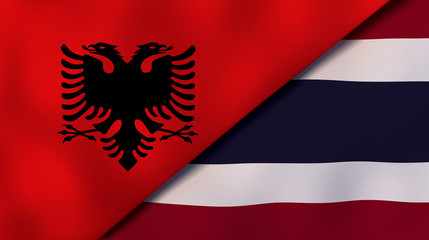 The flags of Albania and Thailand. News, reportage, business background. 3d illustration