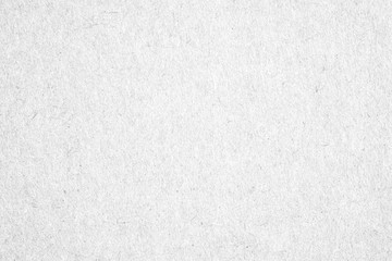 Fototapeta na wymiar White cardboard paper or white concrete / cement wall. can be use as wallpaper, background texture of text for christmas festival, copy space for text.