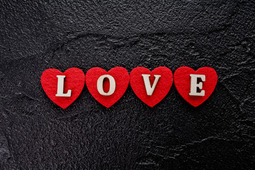 red hearts on black. concept of valentine day, love, wedding.