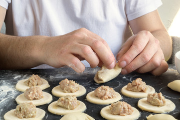 Obraz na płótnie Canvas dough rolled out for cooking dumplings.