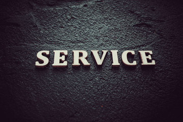 Fototapeta premium Word service written on black background