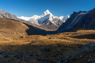 Ama Dablam mountain peak view from Dzongla village before cross Chola pass in Everest region, Himalaya mountains range in Nepal