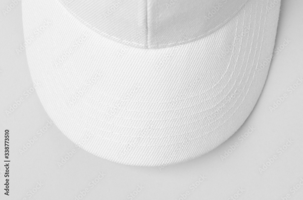 Wall mural White baseball cap mockup closeup.