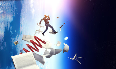 Naklejka premium Businessman jumping on springboard . Mixed media