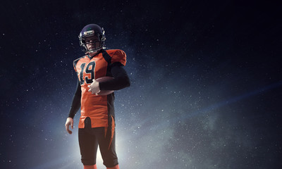 American football player with planet on the background