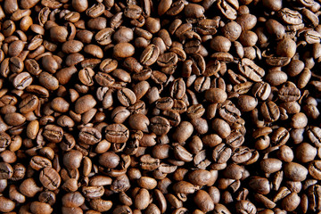 Fresh roasted coffee beans, background texture concept