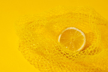 cross section lemon yellow slice background close-up net netting packing package
