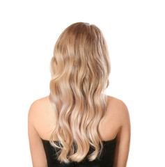 Young blonde with beautiful hair on white background