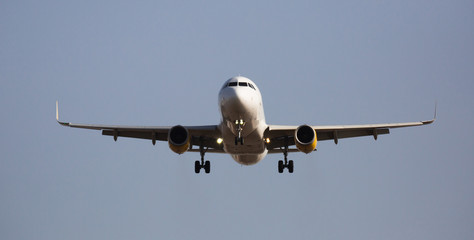 Fototapeta premium Airplane of Vueling airlines approaches for landing