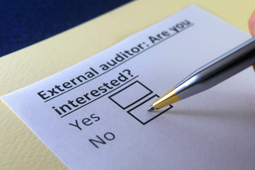 One person is answering question about external auditor.