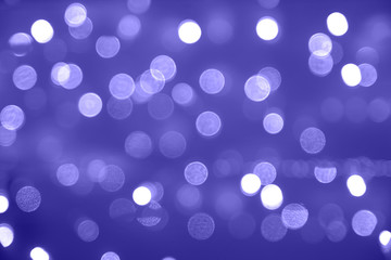 Blue blur background. Round dark bokeh pattern. Neon city shine defocused party. Shiny circle sparkle. Abstract bright space poster. Horizontal color banner