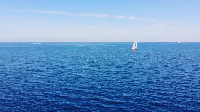 Aerial Drone Shot Of Glamorous Yacht Sailing Across Adriatic Sea. Umag, Croatia.