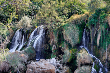 STUDENCI, BOSNIA HERZEGOVINA - 2017 AUGUST 16. Kravice waterfalls on the Trebizat river in Bosnia and Herzegovina.