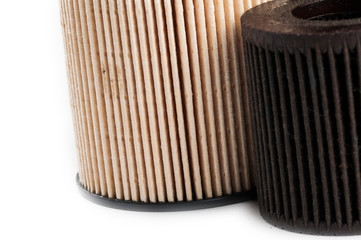 Old  and new oil filter isolated on white background.Copy space