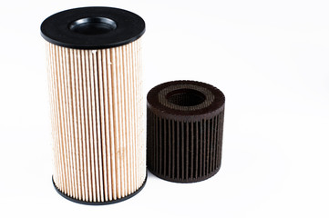 Old  and new oil filter isolated on white background.Copy space