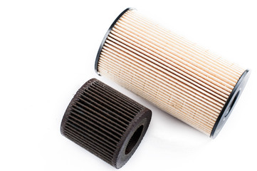 Old  and new oil filter isolated on white background.Copy space