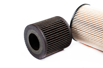 Old  and new oil filter isolated on white background.Copy space