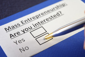 One person is answering question aboutmass entrepreneurship.
