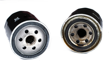 Old  and new oil filter isolated on white background.Copy space