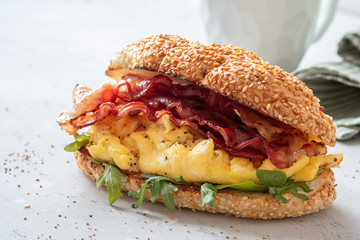 Breakfast bun with scrambled eggs and bacon