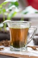 Glass of fresh herbs