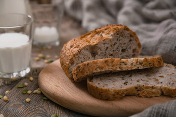 Meal with milk and bread in the country on World Milk Day. Horizontal shot from above.