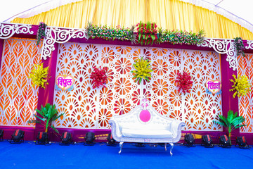 indian wedding ceremony :stage decoration with lighting and flower