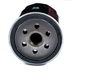 New oil filter isolated on white background.Copy space