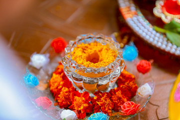 Obraz na płótnie Canvas Indian Traditional Wedding: Turmeric powder in bowl for haldi ceremony