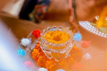 Indian Traditional Wedding: Turmeric powder in bowl for haldi ceremony