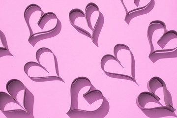 Pretty Pink Paper Hearts on Coloured background