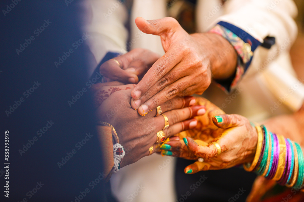 Wall mural bride and groom hands , indian wedding