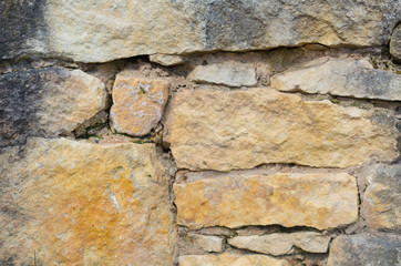 Background of masonry stone walls, the architecture of the limestone
