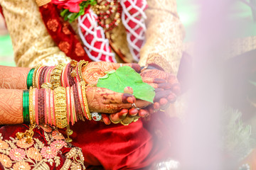bride and groom hands , indian wedding