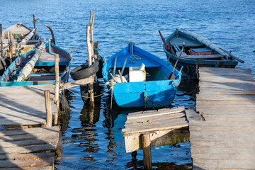 Detail of some boats floating in the pier of Playa Larga, a little town in the south of Cuba
