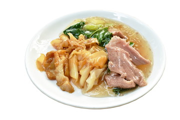 stir fried rice noodles with slice fermenting pork and Chinese kale in gravy sauce on plate