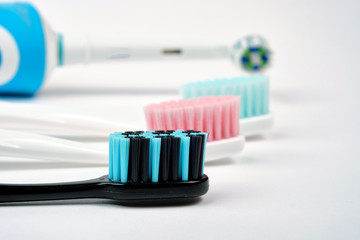Colorful toothbrushes close-up on a white background. Oral hygiene. care for the oral cavity