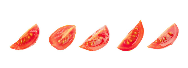 Set of halves of cherry tomatoes on a white background