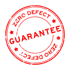 Grunge red zero defect guarantee word round rubber seal stamp on white background