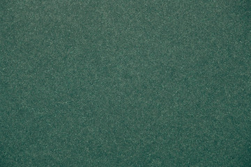 Green textured paper background