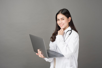  Woman Doctor is using  laptop