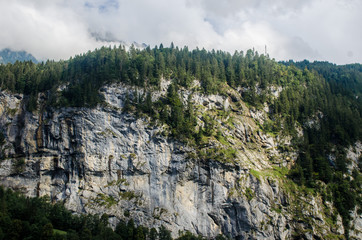 Valley of 72 waterfalls.
Waterfall on the mountain.
Alpine waterfall on a beautiful rock in the mountains.
Summer in the Lauterbrunnen valley or valley of the 72 waterfalls. Interlaken, Switzerland