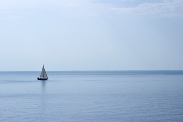 Lonely boat sailing the Adriatic sea