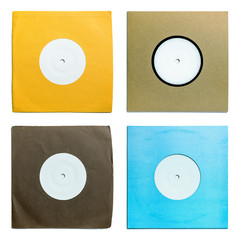 Single seven inch vinyl records in color sleeves